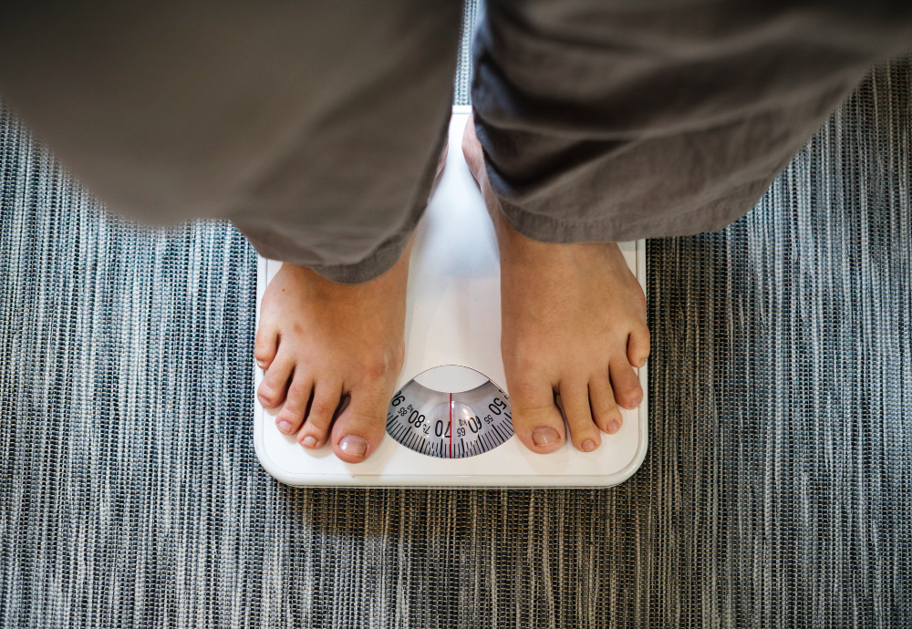 Person standing on a weighing scale