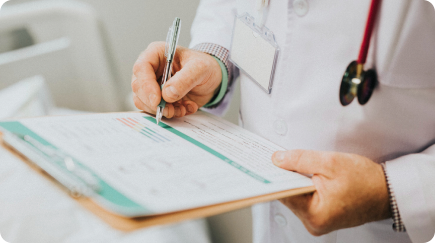 Doctor reviewing professional indemnity documents